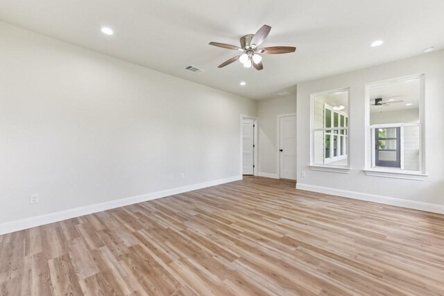 130 Mokalau Dr, Bastrop, TX 78602 - spare room featuring ceiling fan, light wood-type flooring, and recessed lighting