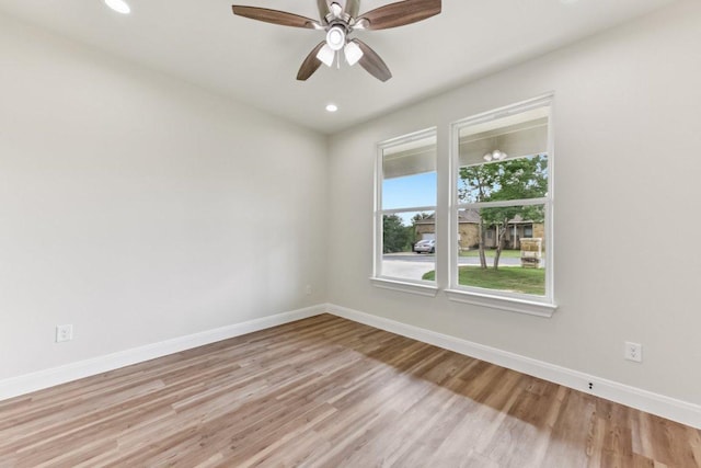 130 Mokalau Dr, Bastrop, TX 78602 - empty room featuring light wood-style flooring, recessed lighting, and ceiling fan
