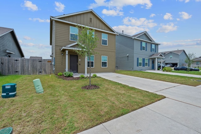 17704 Oso Cv, Elgin, TX 78621 - view of front facade featuring board and batten siding and concrete driveway