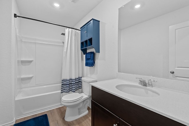 17704 Oso Cv, Elgin, TX 78621 - bathroom with wood finished floors, vanity, shower / tub combo with curtain, and recessed lighting