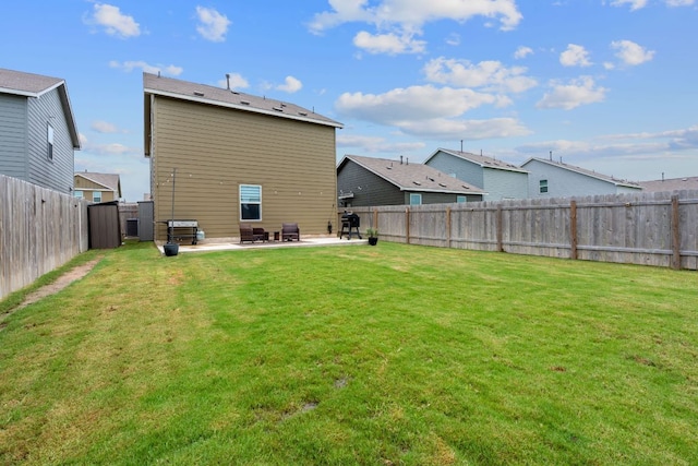 17704 Oso Cv, Elgin, TX 78621 - back of house with a patio and a fenced backyard