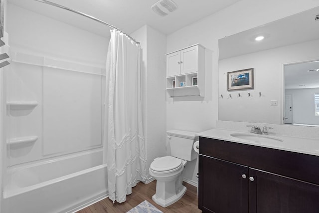 17704 Oso Cv, Elgin, TX 78621 - full bathroom featuring wood finished floors, vanity, shower / bath combo, and recessed lighting