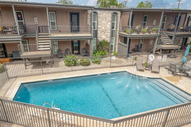 5820 Berkman Dr Unit 205, Austin, TX 78723 - community pool with stairway and a patio