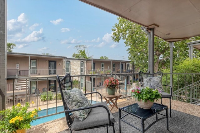 5820 Berkman Dr Unit 205, Austin, TX 78723 - balcony with view of pool area