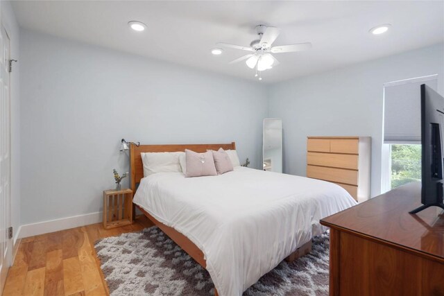 5820 Berkman Dr Unit 205, Austin, TX 78723 - bedroom featuring wood finished floors, recessed lighting, and a ceiling fan