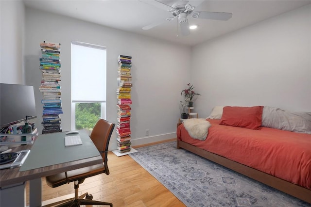 5820 Berkman Dr Unit 205, Austin, TX 78723 - bedroom with light wood-type flooring, an office area, recessed lighting, and a ceiling fan