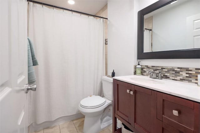 5820 Berkman Dr Unit 205, Austin, TX 78723 - bathroom with vanity, tasteful backsplash, tile patterned flooring, and a shower with shower curtain