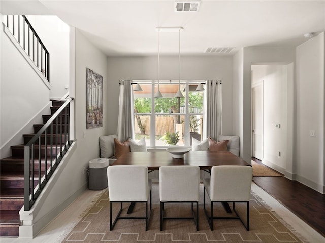 5408 Prock Ln Unit A, Austin, TX 78721 - dining space with stairs and wood finished floors