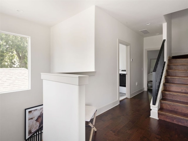 5408 Prock Ln Unit A, Austin, TX 78721 - staircase featuring wood finished floors and recessed lighting