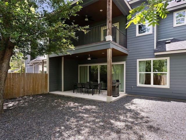 5408 Prock Ln Unit A, Austin, TX 78721 - back of house featuring a balcony, a ceiling fan, and a patio area