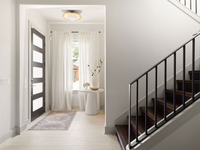5408 Prock Ln Unit A, Austin, TX 78721 - foyer entrance with stairway and baseboards