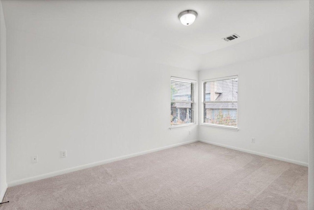 211 Longmont Ln, Austin, TX 78737 - spare room featuring light colored carpet