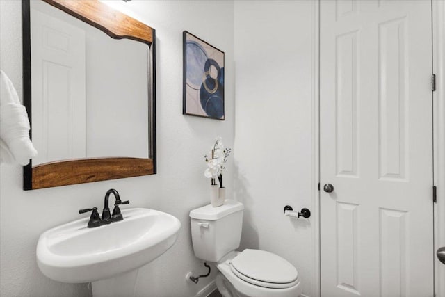 211 Longmont Ln, Austin, TX 78737 - bathroom with a sink and toilet