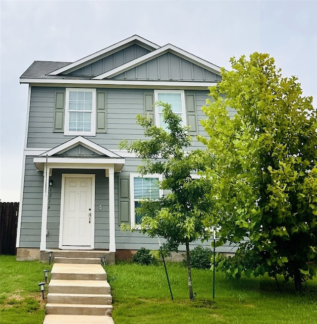 1214 Smallmouth Rd, Bastrop, TX 78602 - view of front of home featuring board and batten siding