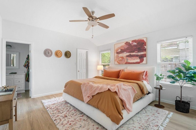 9273 Vigen Cir, Austin, TX 78748 - bedroom featuring light wood-type flooring, vaulted ceiling, and a ceiling fan