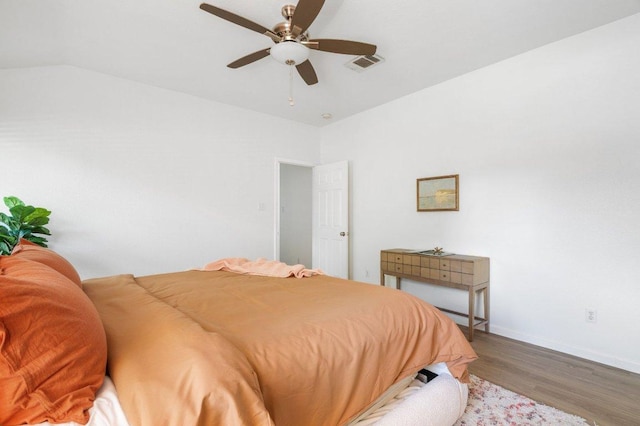 9273 Vigen Cir, Austin, TX 78748 - bedroom featuring wood finished floors, lofted ceiling, and a ceiling fan