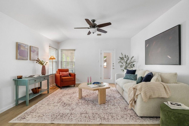9273 Vigen Cir, Austin, TX 78748 - living room with wood finished floors, a ceiling fan, and lofted ceiling