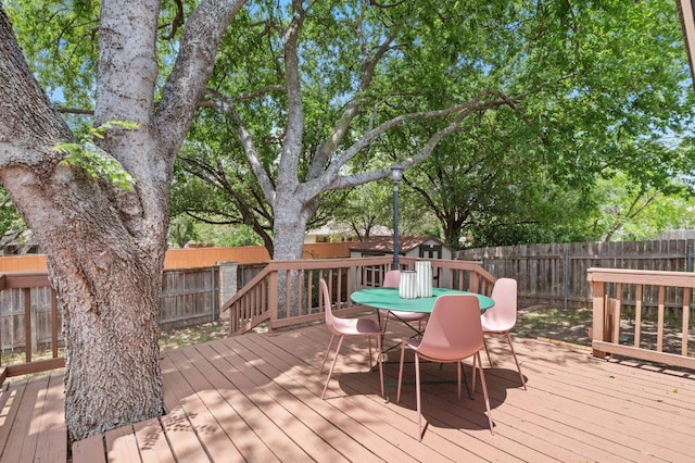 9273 Vigen Cir, Austin, TX 78748 - wooden terrace featuring a fenced backyard and outdoor dining space