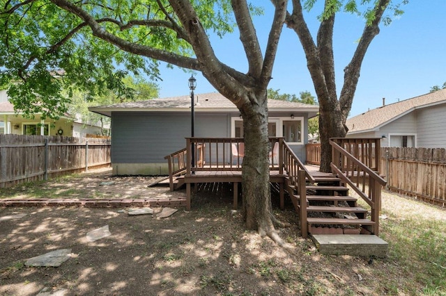 9273 Vigen Cir, Austin, TX 78748 - rear view of property with a deck, a fenced backyard, and stairs