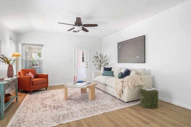 9273 Vigen Cir, Austin, TX 78748 - living room with wood finished floors, ceiling fan, and vaulted ceiling