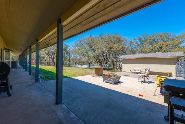 2700 County Road 224, Florence, TX 76527 - view of patio / terrace featuring an outdoor fire pit and area for grilling
