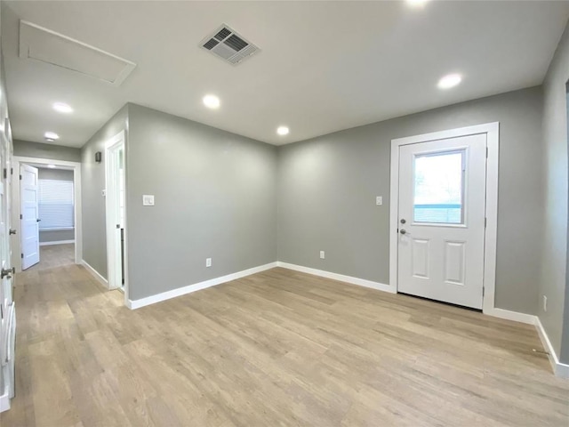 6920 Bethune Ave, Austin, TX 78752 - entryway featuring light wood-style flooring and recessed lighting