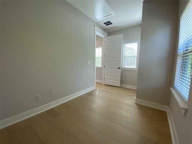 6920 Bethune Ave, Austin, TX 78752 - spare room with attic access and light wood-style floors