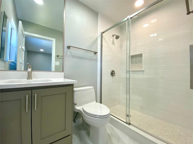 6920 Bethune Ave, Austin, TX 78752 - bathroom with a shower stall, marble look tile flooring, vanity, and recessed lighting