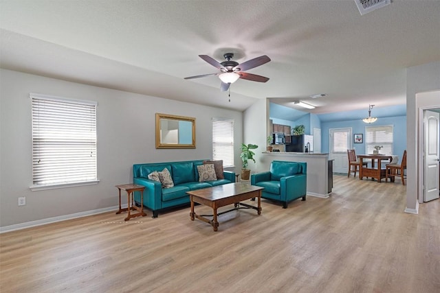 233 Voss, Kyle, TX 78640 - living room featuring light wood-style flooring and ceiling fan