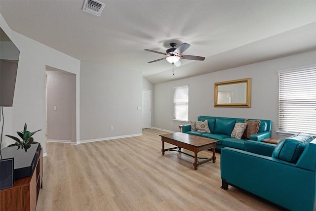 233 Voss, Kyle, TX 78640 - living area with ceiling fan and light wood finished floors