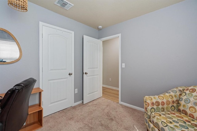 233 Voss, Kyle, TX 78640 - office area featuring light colored carpet and baseboards