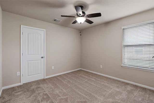 233 Voss, Kyle, TX 78640 - carpeted empty room featuring a ceiling fan and baseboards