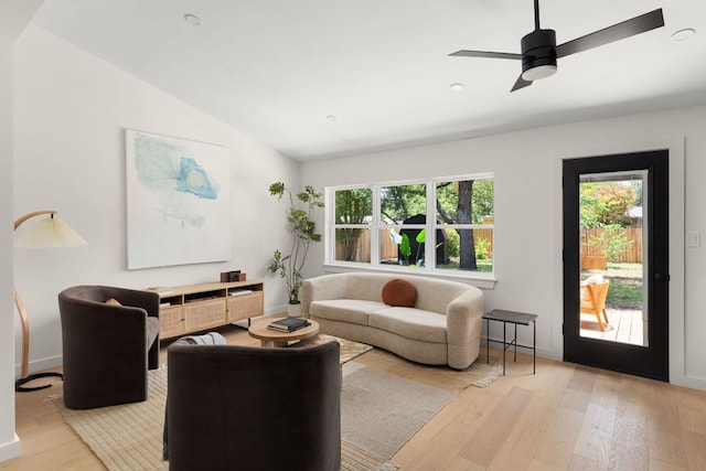 1405 Ridgehaven Dr, Austin, TX 78723 - living room featuring light wood-style floors, plenty of natural light, lofted ceiling, and ceiling fan