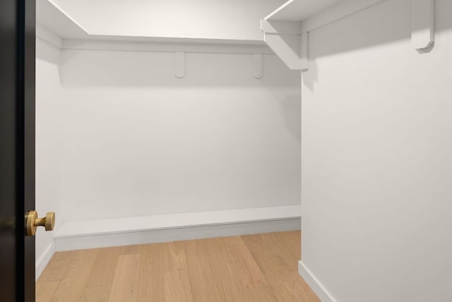 1405 Ridgehaven Dr, Austin, TX 78723 - spacious closet featuring wood finished floors