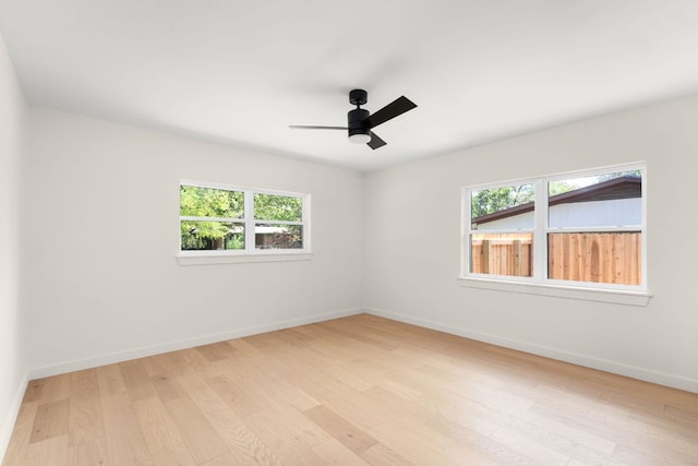 1405 Ridgehaven Dr, Austin, TX 78723 - empty room with light wood-style flooring and a ceiling fan