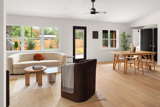 1405 Ridgehaven Dr, Austin, TX 78723 - living area with light wood-type flooring, a ceiling fan, and vaulted ceiling
