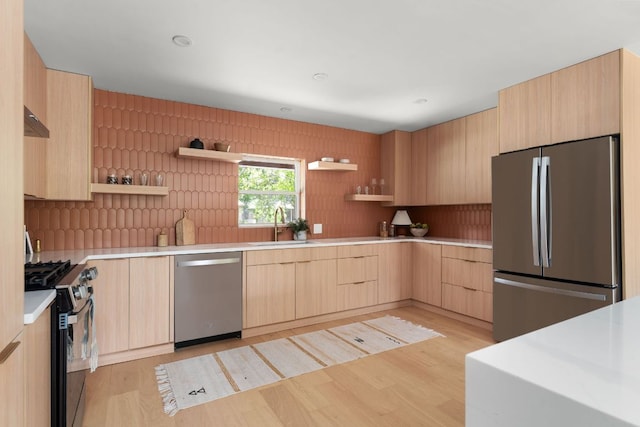 1405 Ridgehaven Dr, Austin, TX 78723 - kitchen featuring appliances with stainless steel finishes, light brown cabinets, open shelves, and modern cabinets