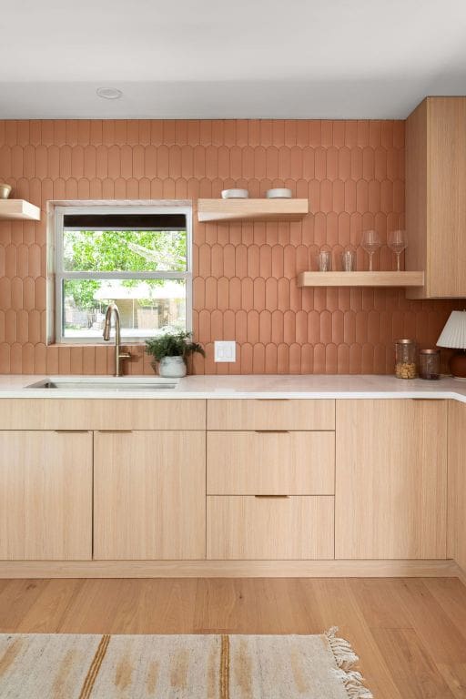 1405 Ridgehaven Dr, Austin, TX 78723 - kitchen featuring light brown cabinetry, open shelves, and light countertops