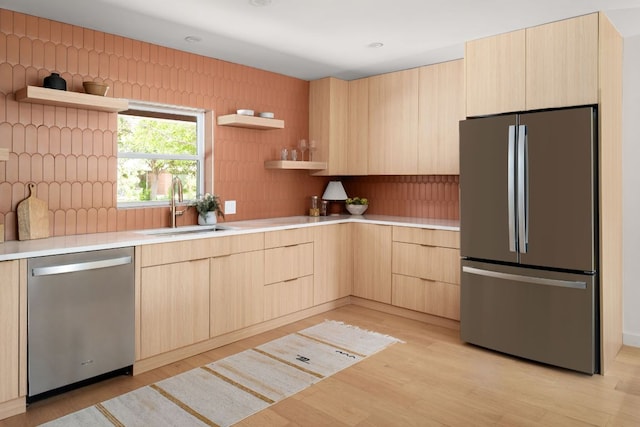 1405 Ridgehaven Dr, Austin, TX 78723 - kitchen with stainless steel appliances, light brown cabinetry, open shelves, and modern cabinets