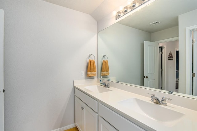 2049 Cartway Ct, Leander, TX 78641 - bathroom with baseboards and double vanity