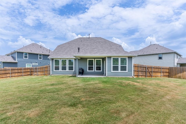 2049 Cartway Ct, Leander, TX 78641 - back of property with a fenced backyard, a patio area, and a shingled roof