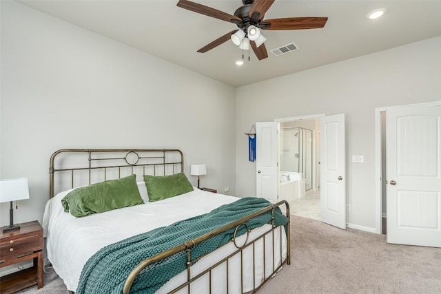 2049 Cartway Ct, Leander, TX 78641 - bedroom with light carpet, recessed lighting, a ceiling fan, and connected bathroom