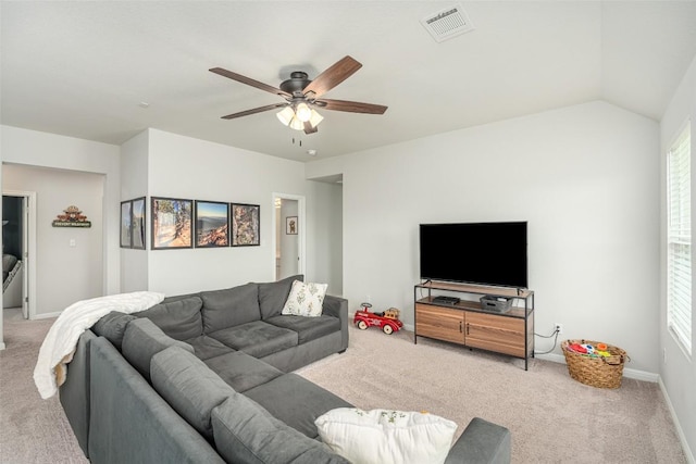 2049 Cartway Ct, Leander, TX 78641 - living area featuring light colored carpet, a ceiling fan, and healthy amount of natural light