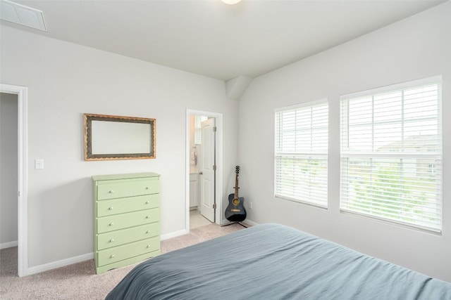 2049 Cartway Ct, Leander, TX 78641 - bedroom with light carpet and connected bathroom