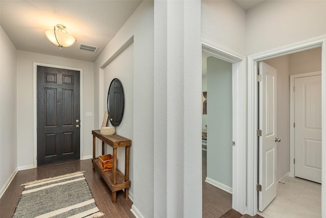 2049 Cartway Ct, Leander, TX 78641 - entryway with baseboards and wood finished floors