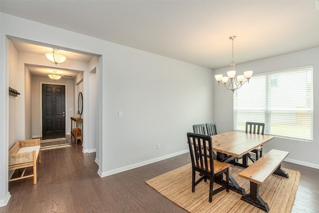 2049 Cartway Ct, Leander, TX 78641 - dining space featuring a chandelier and dark wood-style floors