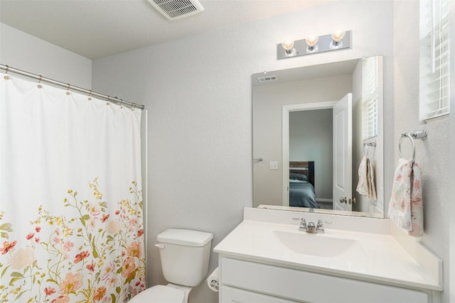 2049 Cartway Ct, Leander, TX 78641 - bathroom featuring vanity, connected bathroom, and curtained shower