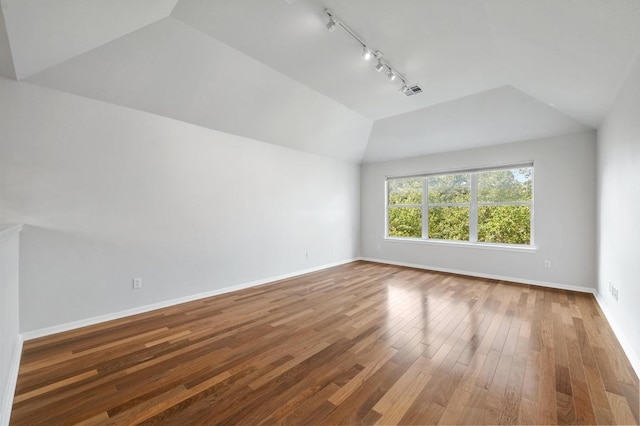 3213 Summer Canyon Dr, Austin, TX 78732 - bonus room with lofted ceiling and wood-type flooring