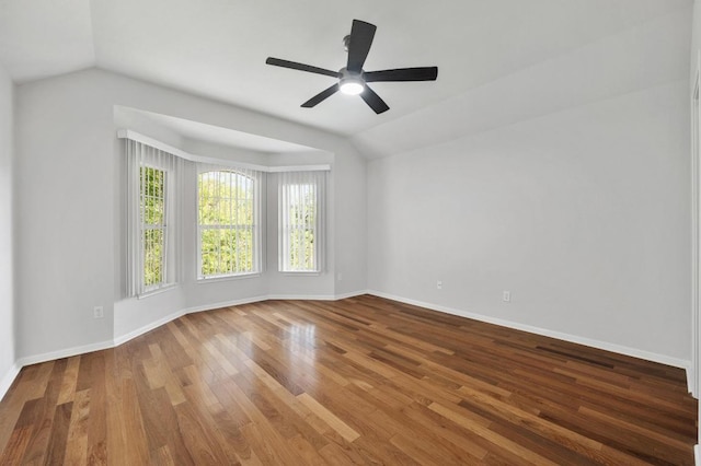 3213 Summer Canyon Dr, Austin, TX 78732 - unfurnished room with vaulted ceiling, wood finished floors, and ceiling fan