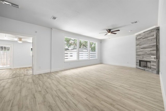 8104 Broken Branch Dr, Round Rock, TX 78681 - unfurnished living room featuring a ceiling fan, wood finished floors, and healthy amount of natural light